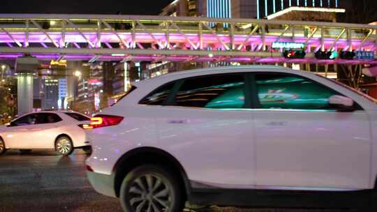 都市城市夜晚夜景人群行人人流汽车车辆车流