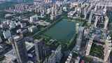 洛阳城市CBD楼房建筑道路交通航拍高清在线视频素材下载