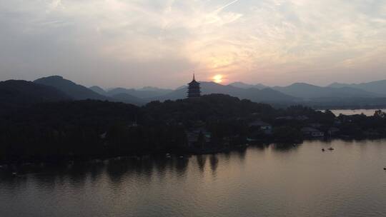 落日夕阳下的杭州西湖雷峰塔航拍