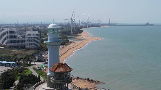 海洋沙滩灯塔风发电大风车