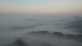 水墨画山川清晨迷雾日出云海航拍高清在线视频素材下载