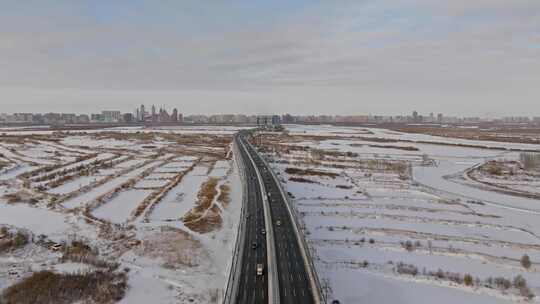 中国黑龙江哈尔滨阳明滩大桥雪景航拍