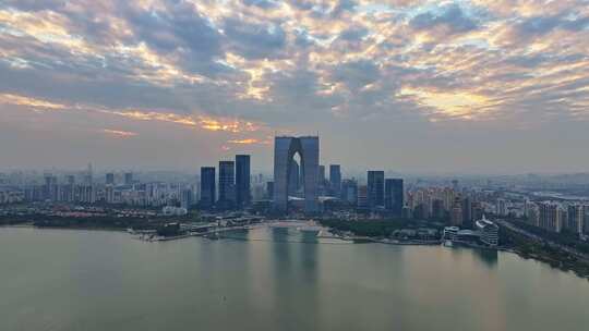 江苏苏州金鸡湖东方之门CBD日落夜景航拍