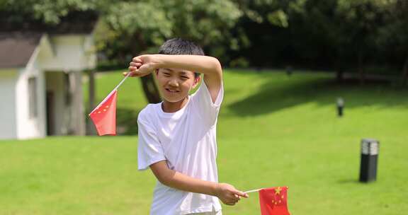 小孩拿着小红旗国庆节爱国慢镜头