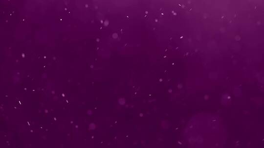 紫色背景下的漂浮粒子