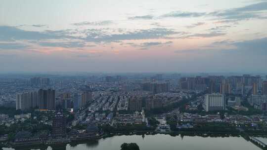 夕阳下的眉山城市风光航拍