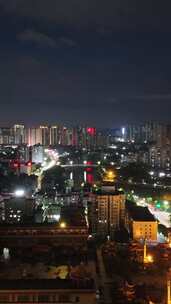 竖屏航拍城市晚霞夜景广西玉林夜景