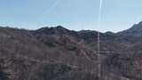 山间蜿蜒公路俯瞰景观高清在线视频素材下载