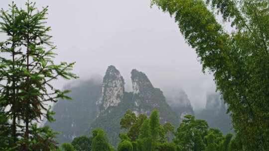 农村下雨雨景远山云雾雨季小雨