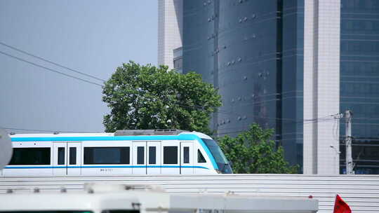 武汉城市轻轨 高楼大厦下列车驶过视频素材模板下载