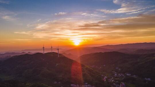 4K航拍大山风车夕阳晚霞落日延时摄影