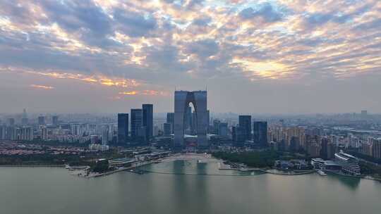 江苏苏州金鸡湖东方之门CBD日落夜景航拍