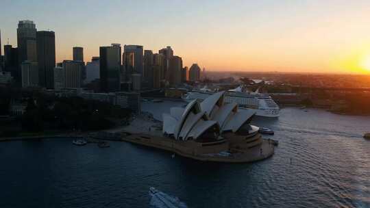 城市航拍澳大利亚悉尼歌剧院日落晚霞大海船