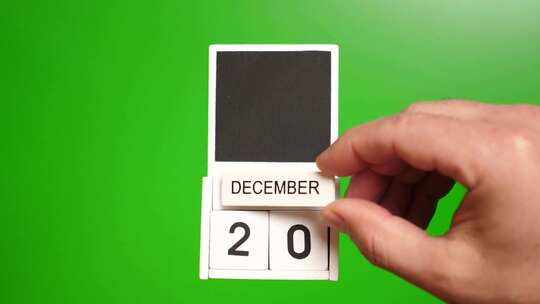 12.绿色背景上日期为12月20日的日历