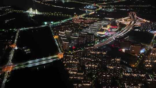 俯瞰夜景城市街道规划亮化车流居民楼变焦