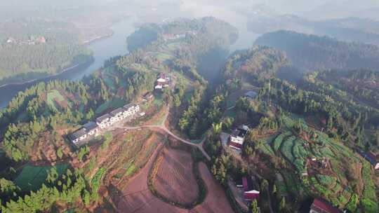 航拍大山深处原始森林青山绿水房屋建筑