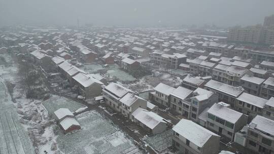 乡村雪原下雪航拍风光