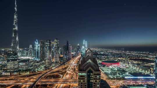 城市航拍迪拜塔摩天大楼汽车夜景灯光天际线
