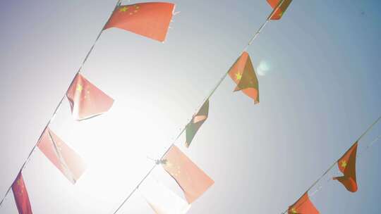 国庆节街道上的红旗彩旗迎风飘扬视频素材模板下载