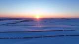 雪后垦区田野夕阳时的唯美时刻高清在线视频素材下载