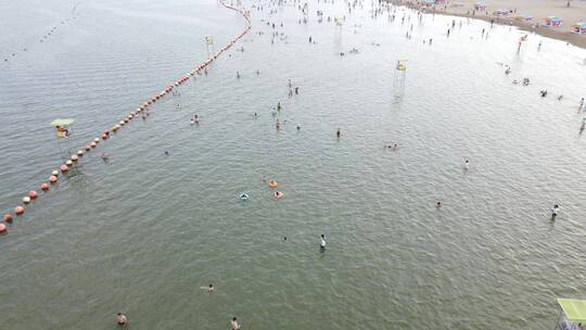 宁波北仑梅山湾沙滩公园滨海万人沙滩4K航拍视频素材模板下载