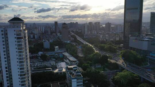 航拍城市雨后烟囱、云、建筑群