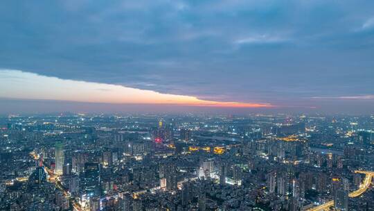 广州城市建筑夜景灯光与天空云彩航拍延时