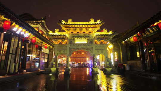 山西大同古城鼓楼夜景飘雪下雨雪景