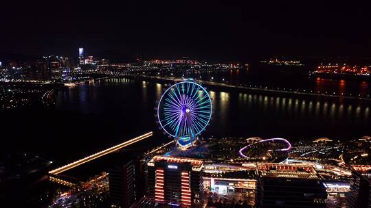 深圳宝安欢乐港湾摩天轮夜景前冲下降