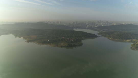 航拍武汉东湖磨山远处城市