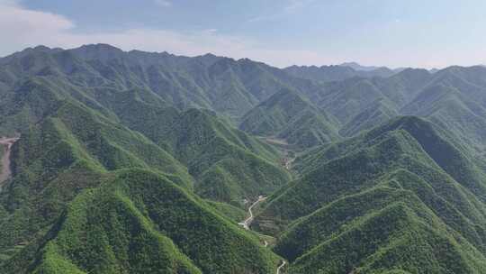 航拍空镜森林大山山脉绿色小路宣传片