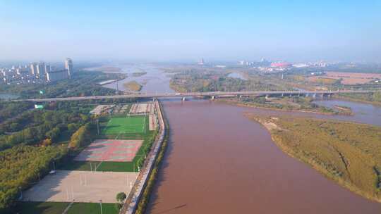 航拍宁夏吴忠国家黄河湿地公园滨河体育馆