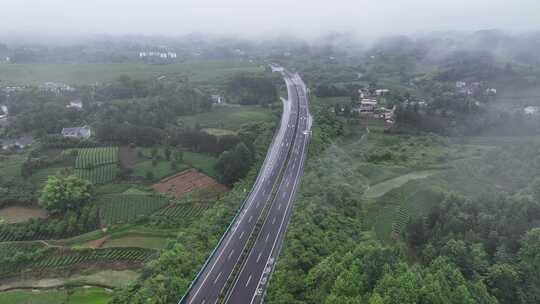 航拍贵州遵义湄潭山野田间夏季茶园风景