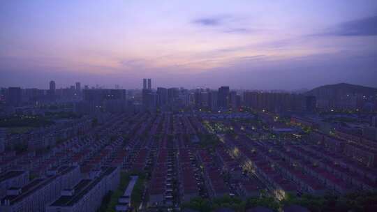 日出晨曦中的杭州滨江城市建筑风景航拍