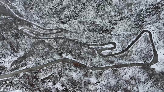 冬天雪后大山公路交通航拍