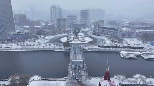 天津解放桥世纪钟雪景航拍视频素材模板下载