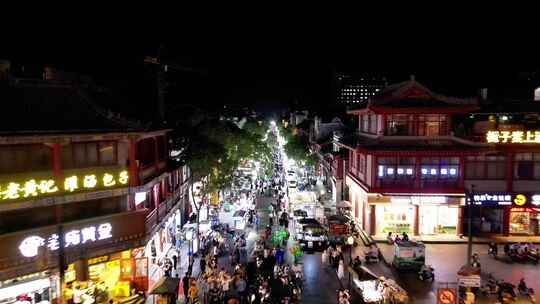 河南开封城市夜景步行街人流航拍视频素材模板下载
