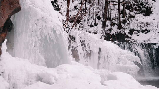 冬季吉林通化吊水壶瀑布升格风景拍摄视频素材模板下载