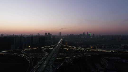 航拍城市天际线与高速公路立交桥