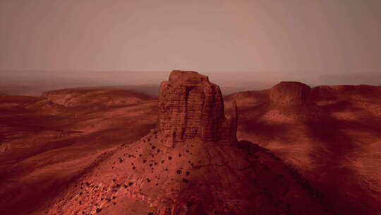 前景中有几块岩石的沙漠图片