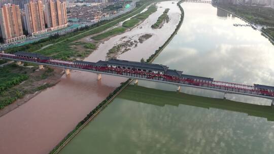 陕西省咸阳市咸阳湖古渡廊桥日落航拍