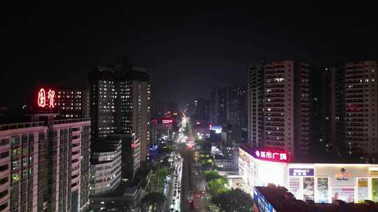 航拍广东湛江国贸大厦夜景