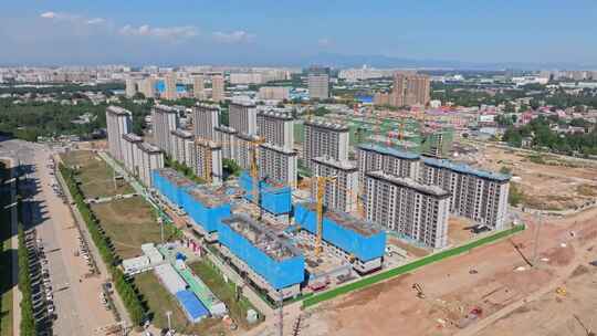 房地产：大规模在建住宅工程及大片高层住宅