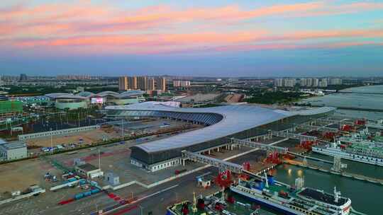 海南海口新海客运枢纽港口航拍日落金色时刻