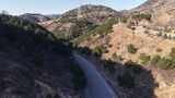 山间蜿蜒公路航拍景象高清在线视频素材下载