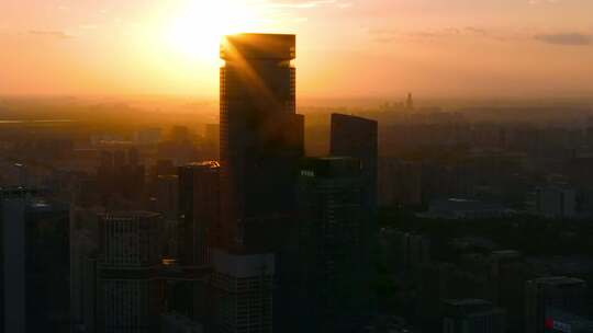 西安高新区都市之门夕阳照射建筑群视频素材模板下载