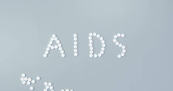 药片拼成艾滋病缩写