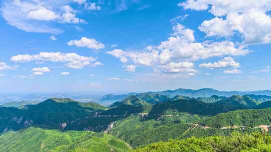 夏季蓝天白云下绿水青山群山航拍