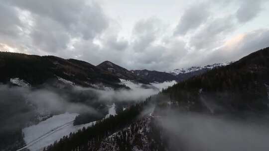 航拍森林雪山树林高山河流阳光蓝天白云