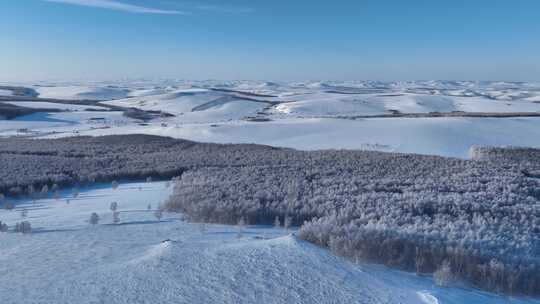 空中拍摄内蒙古寒冬丘陵雪原风光